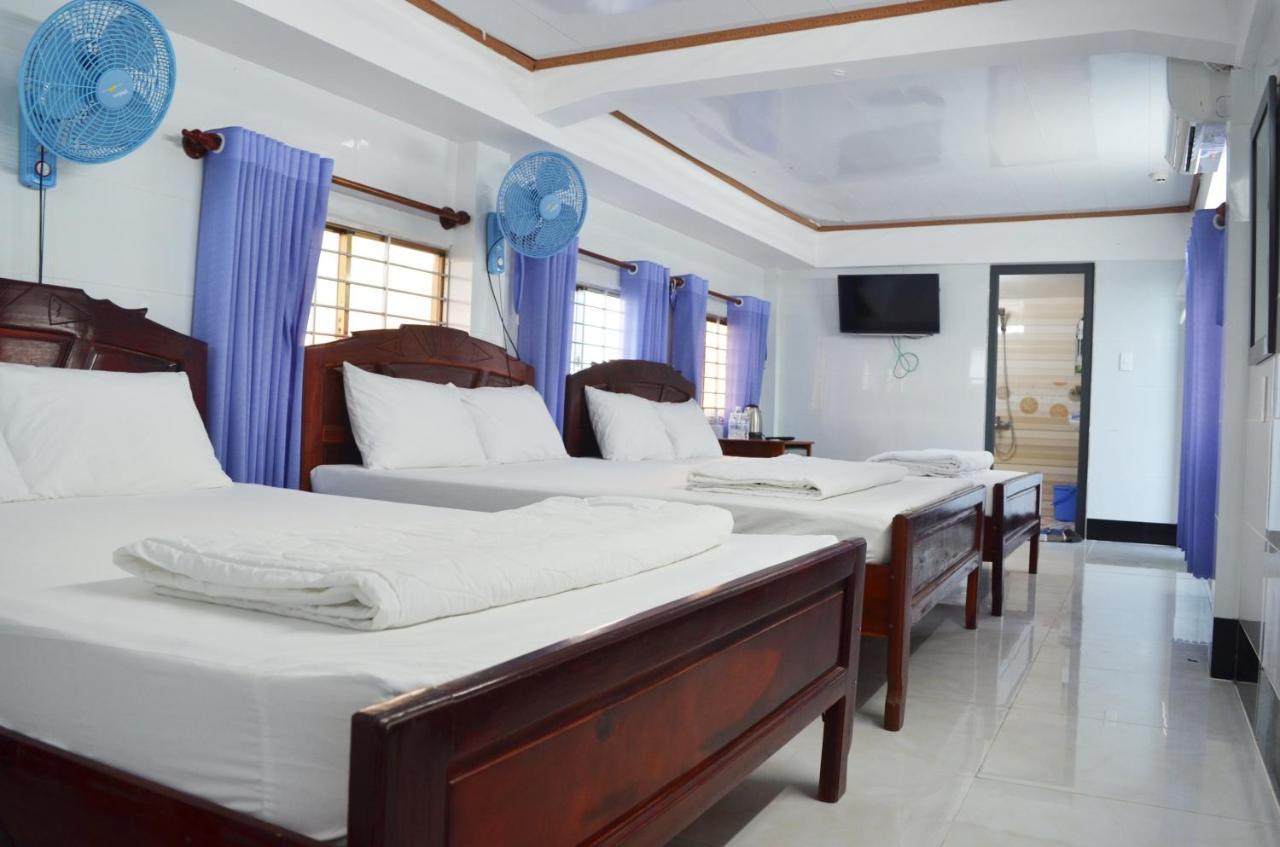 Huong Duong Hotel Dao Phu Quy Ruang foto